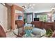 Cozy dining room space leading to the front door and overlooking the living room at 20890 Negril Ct # 5, Lutz, FL 33558