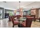 Open dining room offering ample seating with views of the living area at 20890 Negril Ct # 5, Lutz, FL 33558