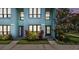 Charming two-story townhome with a beautifully landscaped front yard and a welcoming entrance at 20890 Negril Ct # 5, Lutz, FL 33558