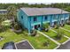The home features a well-maintained lawn and a cozy patio area, perfect for outdoor relaxation at 20890 Negril Ct # 5, Lutz, FL 33558
