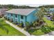 The home is surrounded by lush greenery and a well-manicured lawn, creating a serene ambiance at 20890 Negril Ct # 5, Lutz, FL 33558