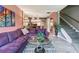 Comfortable living room with an adjacent staircase and clear view to the kitchen at 20890 Negril Ct # 5, Lutz, FL 33558
