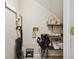 Under-stair storage space with shelving, providing practical solutions for organizing cleaning supplies and household items at 20890 Negril Ct # 5, Lutz, FL 33558