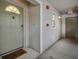 Building entrance showing unit number, welcome mat and nearby stairwell at 21103 Patio View Ct # 3305, Lutz, FL 33558