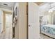 Hallway leading to a bedroom and bathroom, showcasing the layout and flow of the home at 21103 Patio View Ct # 3305, Lutz, FL 33558