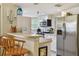Well-lit kitchen featuring stainless steel appliances and ample cabinet space at 21103 Patio View Ct # 3305, Lutz, FL 33558
