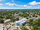 Aerial view showcasing a modern residential building amidst a bustling urban neighborhood at 2205 16Th N St, St Petersburg, FL 33704
