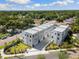 Modern townhome complex featuring clean lines and a neutral color palette in a well-landscaped neighborhood at 2205 16Th N St, St Petersburg, FL 33704