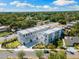 New townhome featuring modern design, landscaping, private garage, and clean street view at 2205 16Th N St, St Petersburg, FL 33704