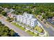 Townhome exterior showcasing modern design, well-maintained landscaping, and architectural details at 2205 16Th N St, St Petersburg, FL 33704
