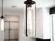 Close up of modern pendant lighting fixture with clear textured glass at 2205 16Th N St, St Petersburg, FL 33704
