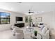 Bright living room with modern furniture, large windows, and sleek hardwood floors at 2205 16Th N St, St Petersburg, FL 33704