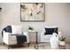 Comfortable sitting area features two chairs, side table and stylish artwork at 2205 16Th N St, St Petersburg, FL 33704