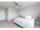 Light and airy bedroom with soft carpet and minimalist decor offers a peaceful and inviting ambiance at 2334 Audubon Preserve Ln, Lutz, FL 33558