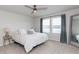 Serene bedroom featuring soft carpet, natural light, and neutral tones for a tranquil retreat at 2334 Audubon Preserve Ln, Lutz, FL 33558