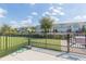 A dog park provides a safe and enclosed space for pets to play and socialize in the community at 2334 Audubon Preserve Ln, Lutz, FL 33558