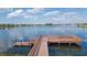 View of the large lake from the community dock and fishing pier at 2334 Audubon Preserve Ln, Lutz, FL 33558