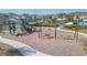 Inviting community playground with slides, swings, and a cushioned ground surface for safe play at 2334 Audubon Preserve Ln, Lutz, FL 33558