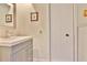 Bathroom featuring a vanity and an adjacent linen closet at 2985 W Knights Ave # 2985, Tampa, FL 33611