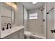 Bathroom featuring tile shower and vanity at 3213 King William Cir, Seffner, FL 33584