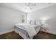 Cozy bedroom with carpet, ceiling fan, and a window bringing in natural light at 3412 W Mckay Ave, Tampa, FL 33609