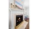 Close-up of a classic fireplace with a decorative mantel and golden accents at 3412 W Mckay Ave, Tampa, FL 33609