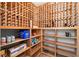 Custom wooden wine racks and shelves to accommodate storage for bottles and cases at 3412 W Mckay Ave, Tampa, FL 33609