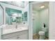 Bathroom featuring a toilet in its own room, tile floors, and a vanity with white cabinets at 3613 Pendleton Way, Land O Lakes, FL 34639