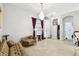 Bright foyer featuring tile flooring, a decorative chandelier, and arched entryway into other parts of the home at 3613 Pendleton Way, Land O Lakes, FL 34639