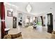 Elegant living room featuring chandelier lighting and a furniture set at 3613 Pendleton Way, Land O Lakes, FL 34639