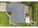 Drone shot of home featuring roof detail, landscaping, hardscape, and patio layout at 3655 Candia Ave, North Port, FL 34286