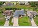 Aerial view of the home showcases its landscaped yard, and proximity to other homes and community features at 3655 Candia Ave, North Port, FL 34286