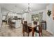 Charming dining area connects to the kitchen and offers easy access to the outdoor patio at 3655 Candia Ave, North Port, FL 34286