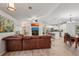 Spacious living area with a kitchen and dining area, perfect for entertaining at 3655 Candia Ave, North Port, FL 34286