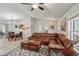 Open-concept living room with a dining area, comfortable seating, and modern décor at 3655 Candia Ave, North Port, FL 34286