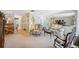 Inviting living room with neutral carpet and comfortable seating at 4222 Richmere Dr # 4222, New Port Richey, FL 34652