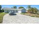 Charming home with a well-manicured lawn, a paved driveway and a one car garage at 4662 Dewey Dr, New Port Richey, FL 34652