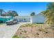 Charming home with a well-manicured lawn, a paved driveway and a one car garage at 4662 Dewey Dr, New Port Richey, FL 34652