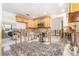 Kitchen with a stylish tile floor and oak colored cabinets and under renovation at 4662 Dewey Dr, New Port Richey, FL 34652