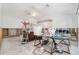 Spacious living room exhibiting the studs in the wall, with a ceiling fan at 4662 Dewey Dr, New Port Richey, FL 34652