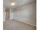 This bedroom offers neutral walls and carpet flooring at 518 Glenn Cross Dr, Ruskin, FL 33570