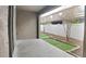 This patio offers decorative turf and a privacy fence at 518 Glenn Cross Dr, Ruskin, FL 33570