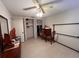 Bedroom featuring a ceiling fan, closet, and ample space for furniture at 5360 Windward Way, New Port Richey, FL 34652