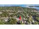An aerial view showcasing the property's location in a tree-filled neighborhood near local stores and attractions at 600 26Th S Ave, St Petersburg, FL 33705