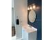 This bathroom features updated vanity and lighting at 600 26Th S Ave, St Petersburg, FL 33705