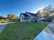 Charming home featuring a well-manicured lawn, mature trees, and a welcoming facade, showcasing its curb appeal at 600 26Th S Ave, St Petersburg, FL 33705