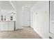 Hallway that shows the open-concept living arrangement and new floors in the home at 600 26Th S Ave, St Petersburg, FL 33705
