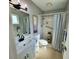 Bathroom featuring modern fixtures, walk-in shower, and neutral colors at 6707 Thorman Rd, Port Charlotte, FL 33981