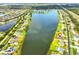 Scenic aerial view of a waterfront neighborhood, highlighting homes with private docks and serene lake views at 6725 Clair Shore Dr, Apollo Beach, FL 33572