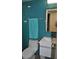 Stylish bathroom featuring blue tile, a modern vanity, and updated fixtures at 7219 Williams S Dr, St Petersburg, FL 33705